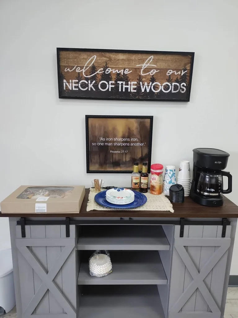 Guest coffee and refreshment station inside the renovated Star Barber Shop